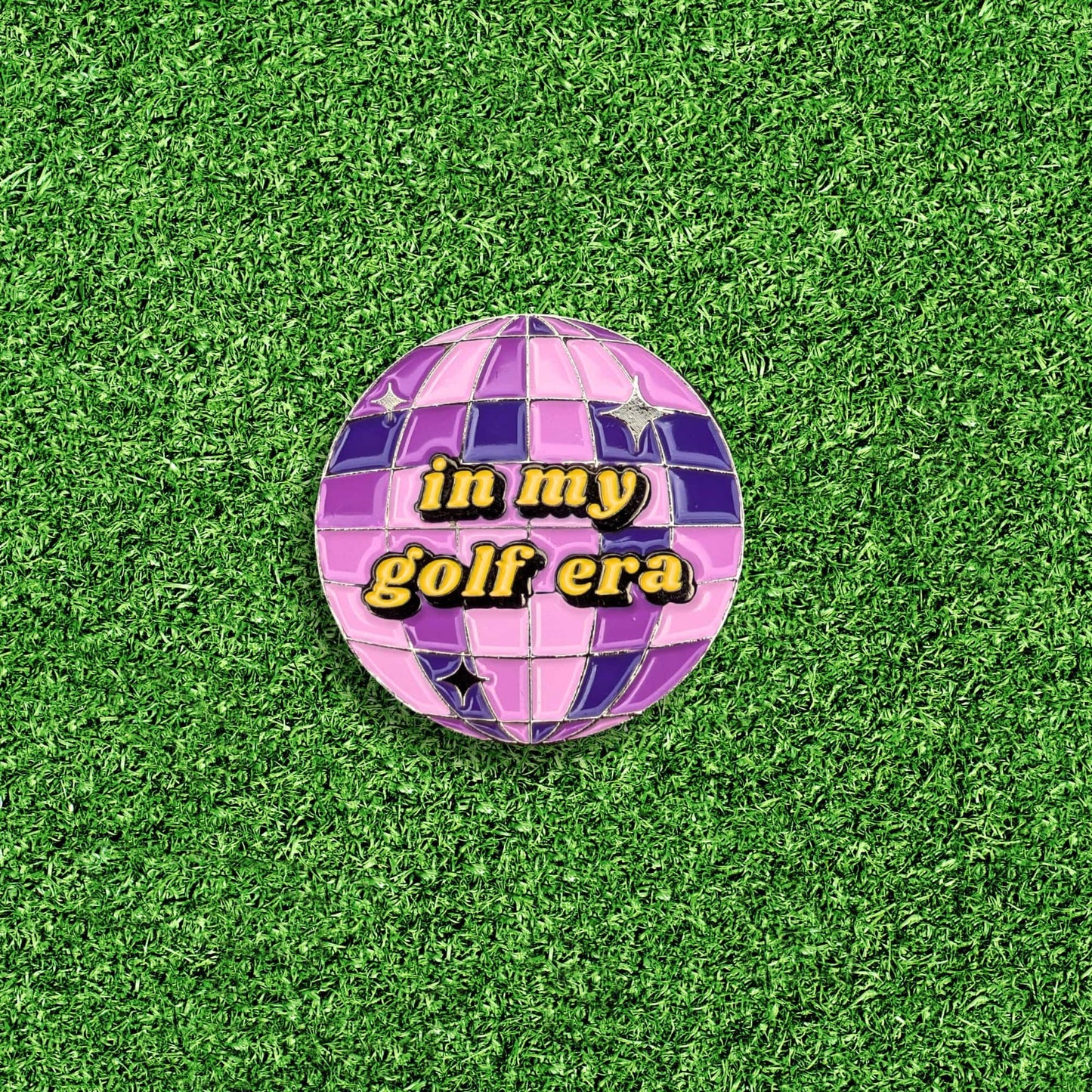 purple mirrorball golf ball marker that says 'in my golf era'