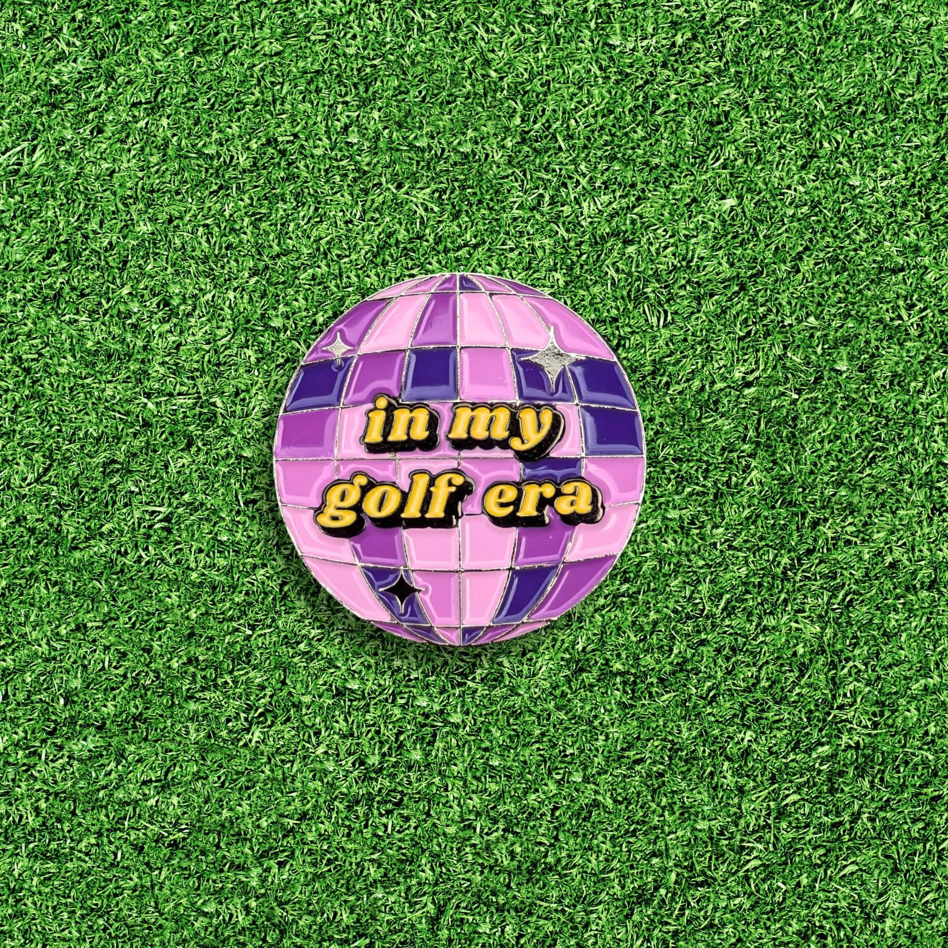 purple mirrorball golf ball marker that says 'in my golf era'