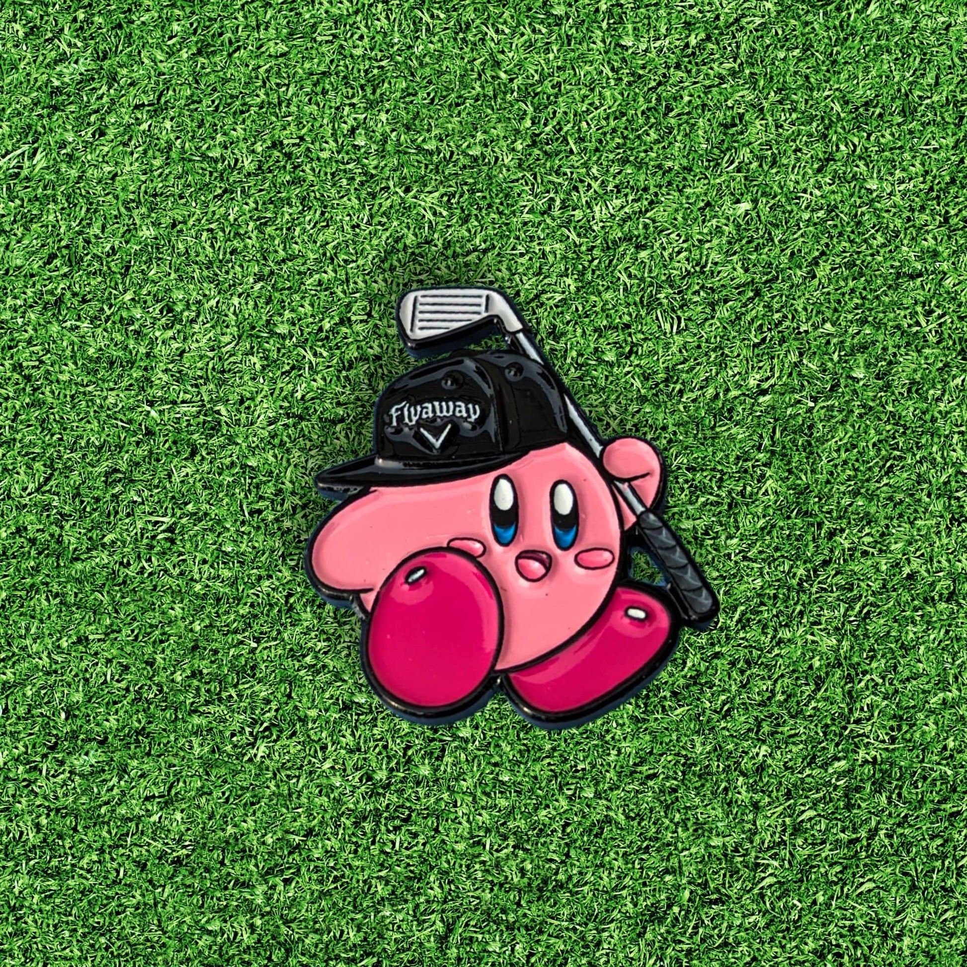 golf ball marker shaped like pink super smash character holding a golf club